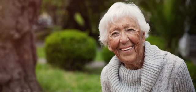 Senior Woman Smiling Outside